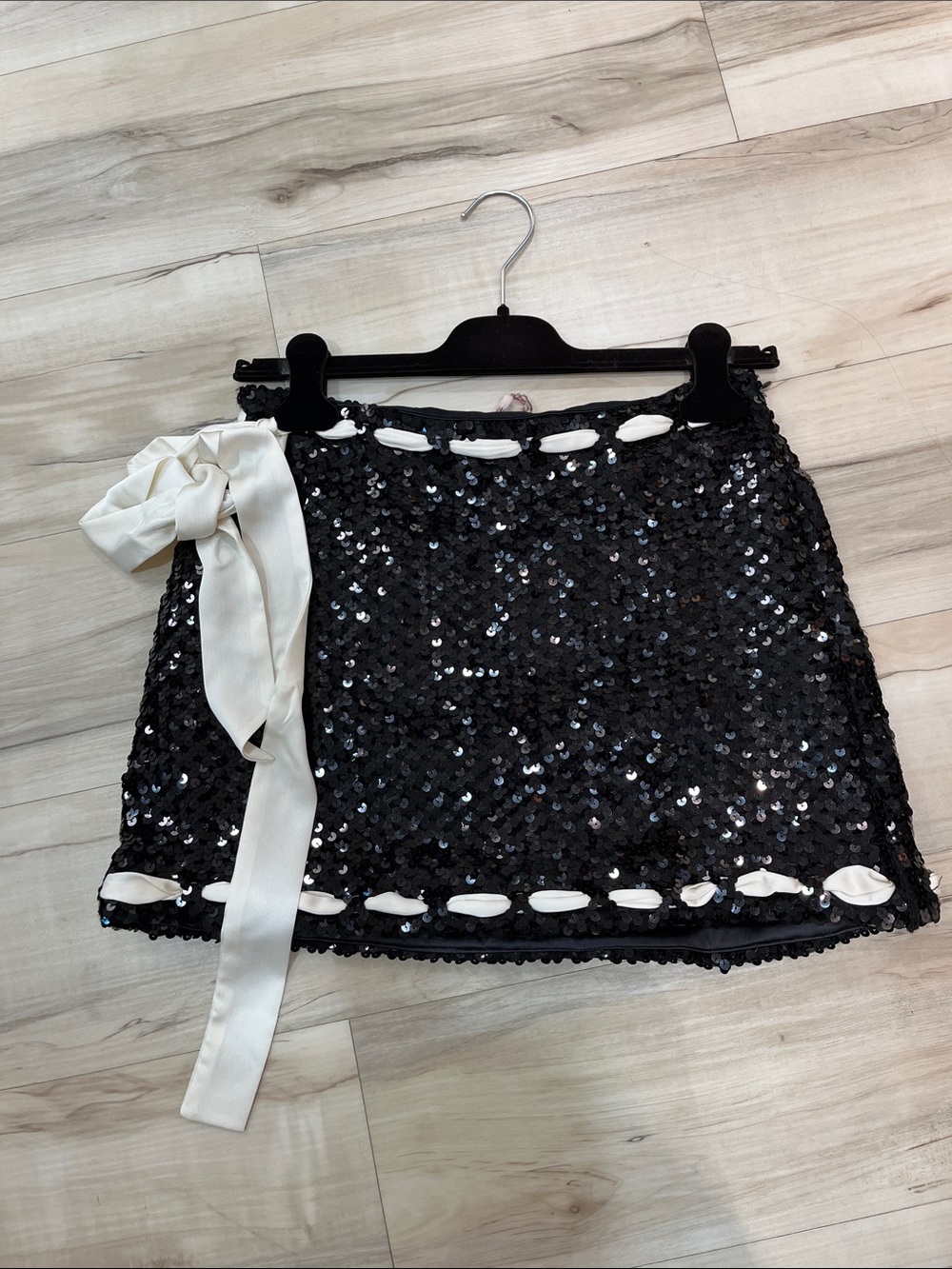 Love Shack Fancy Black Sequin Mini Skirt with Cream Ribbon Accent